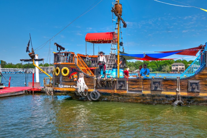 a small boat in a large body of water