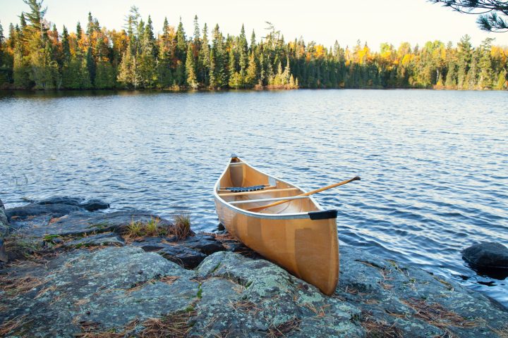a small boat in a body of water