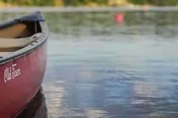 a small boat in a body of water