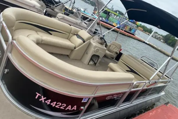 a boat sitting on top of a car