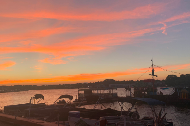 a sunset over a body of water