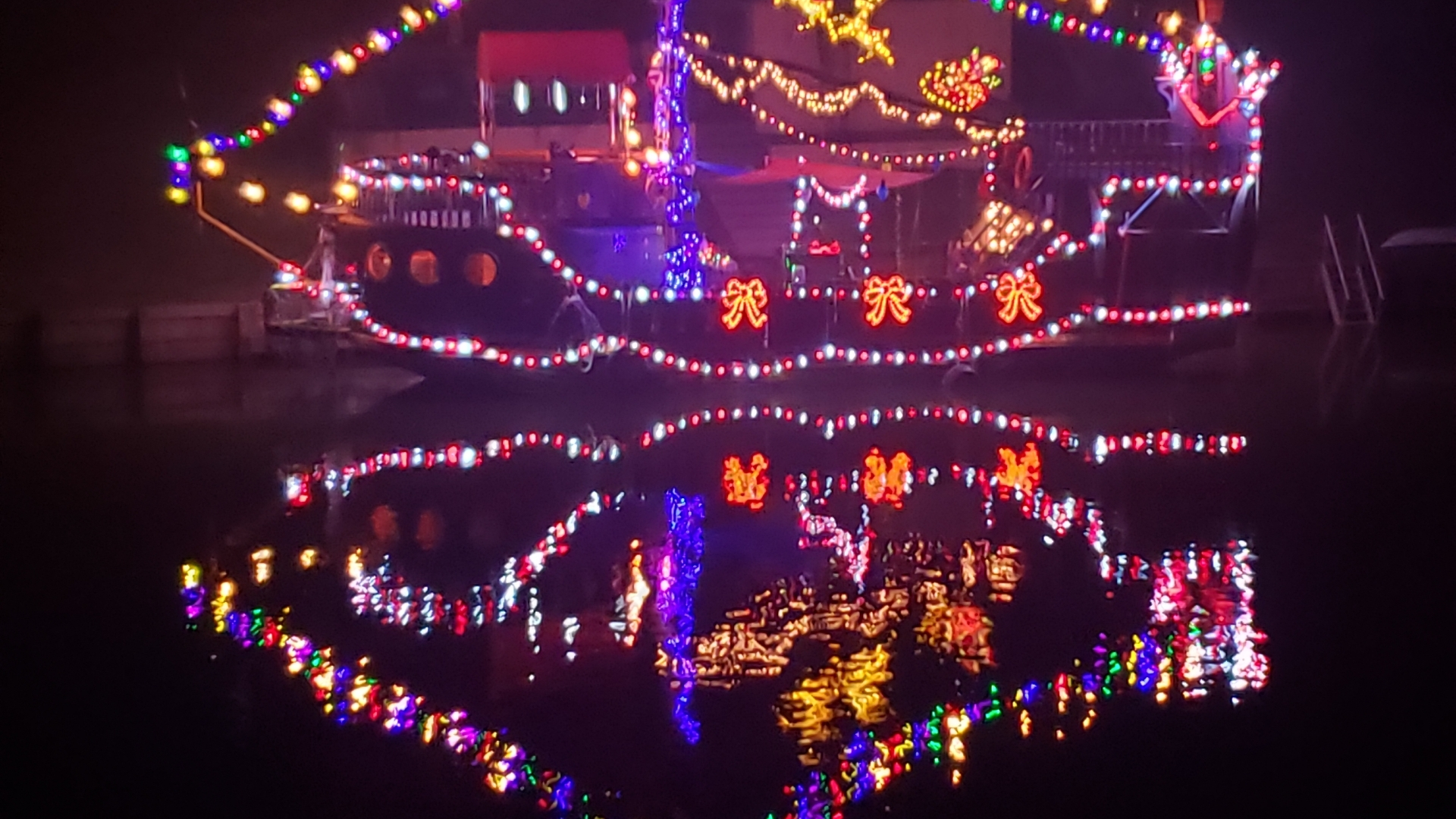 a traffic light is lit up at night