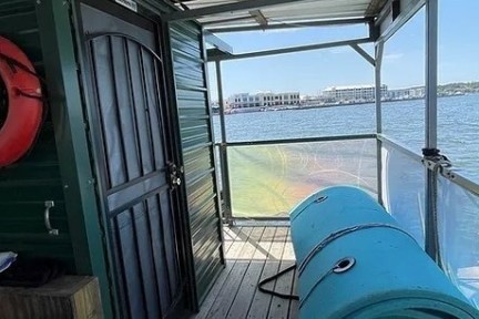 a boat that is sitting on the side of a building