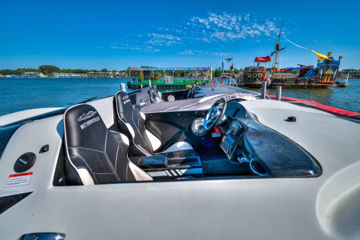 a boat parked next to a body of water