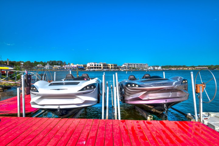 a group of lawn chairs sitting on top of a beach