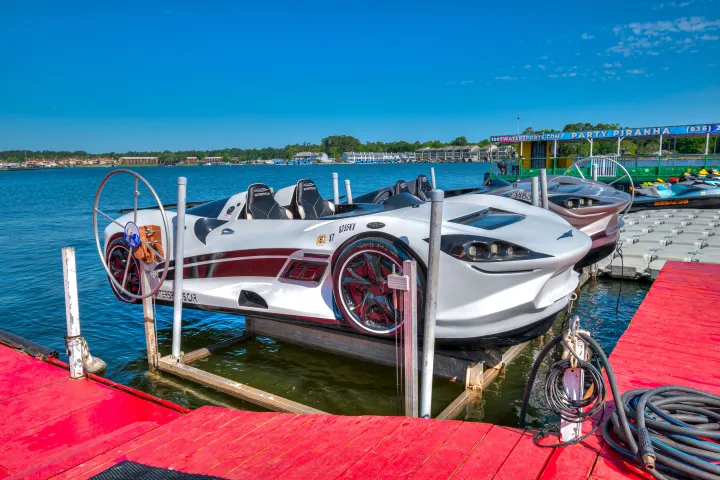 a boat is docked next to a body of water
